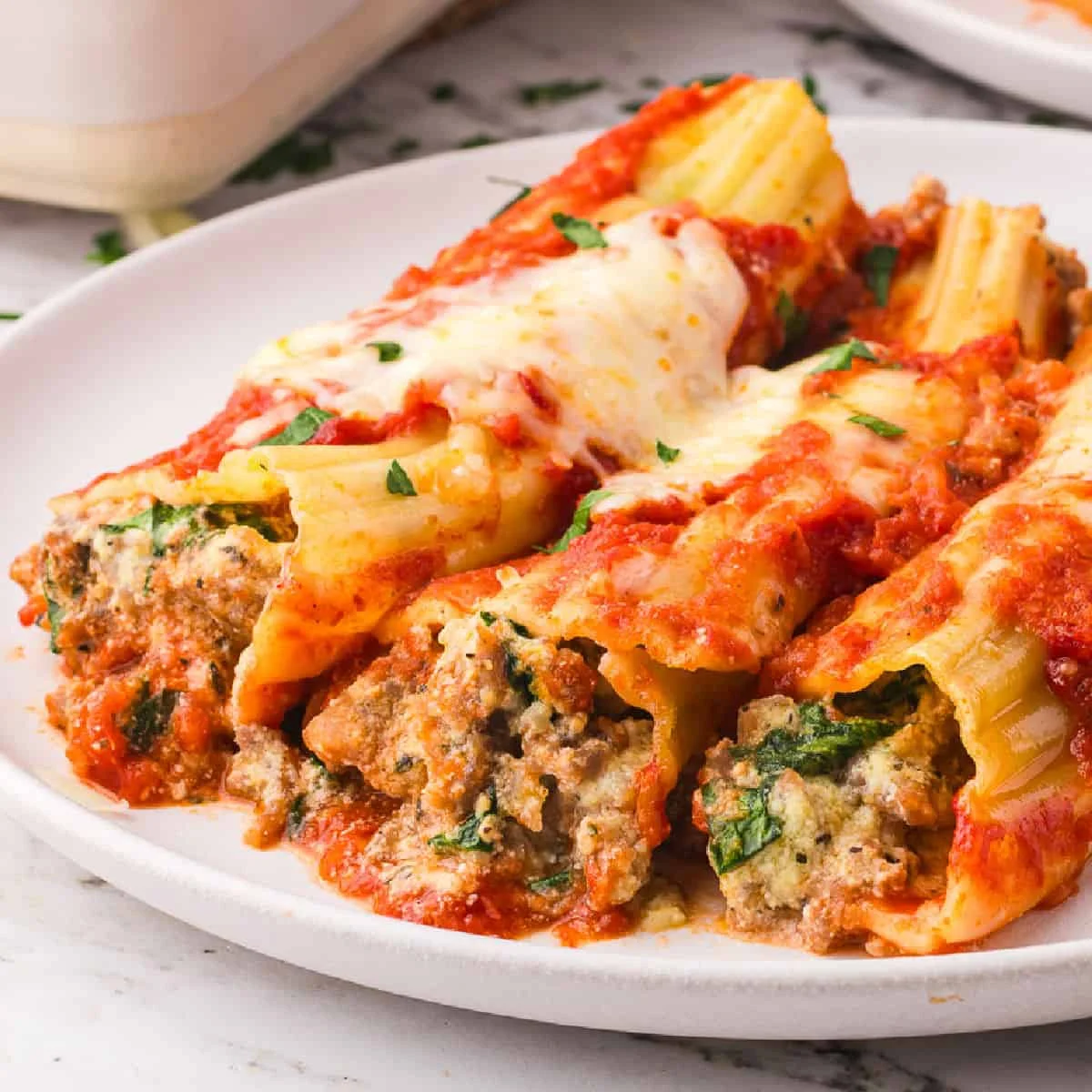 Mixed sausage-and-ricotta filling in a glass bowl