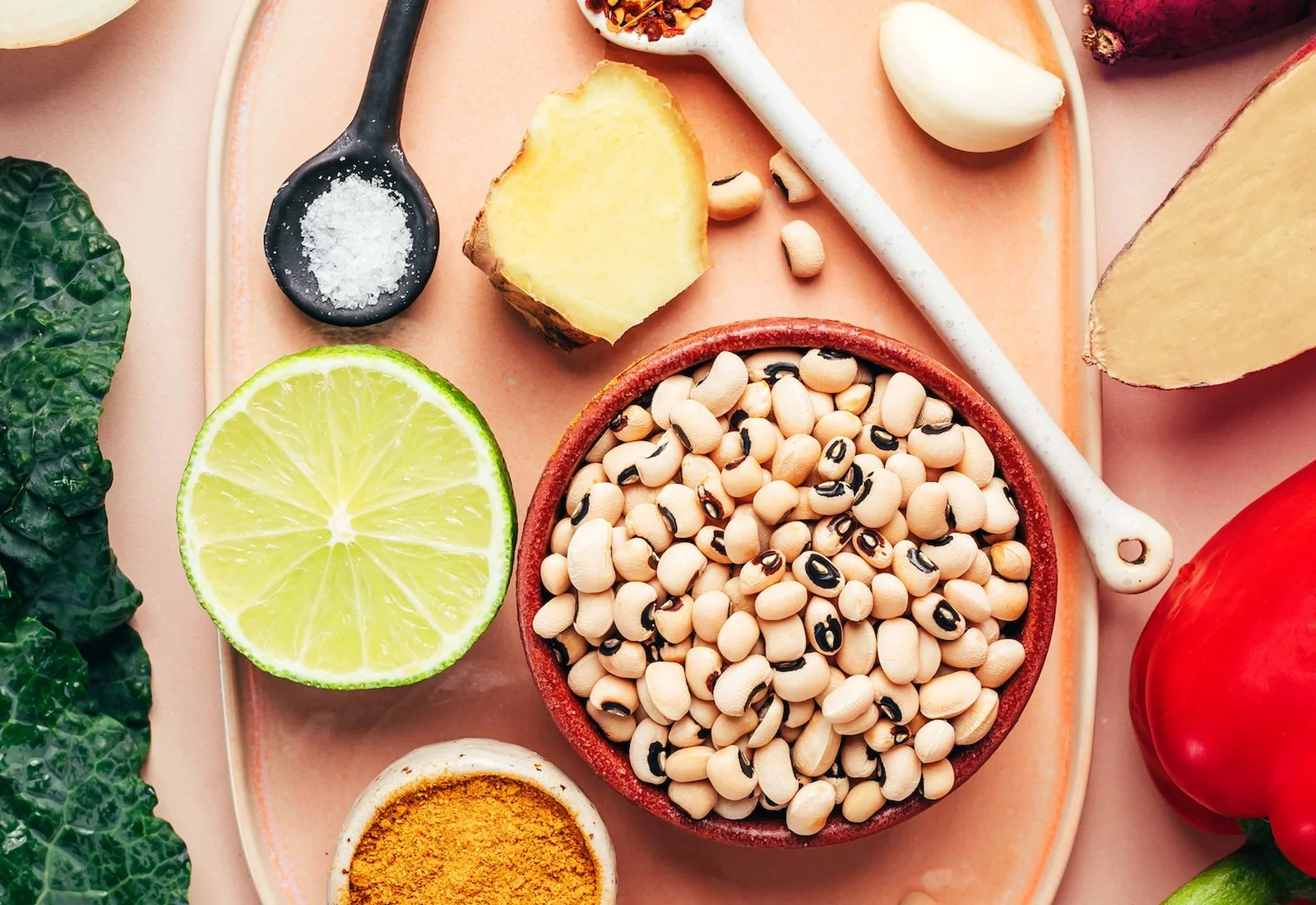 Black eyed peas, sweet potato, and spices laid out