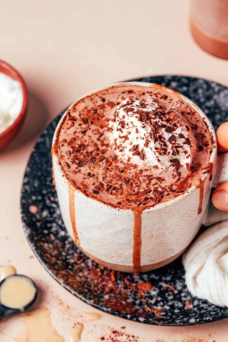 Finished tahini hot chocolate with whipped cream and chocolate shavings