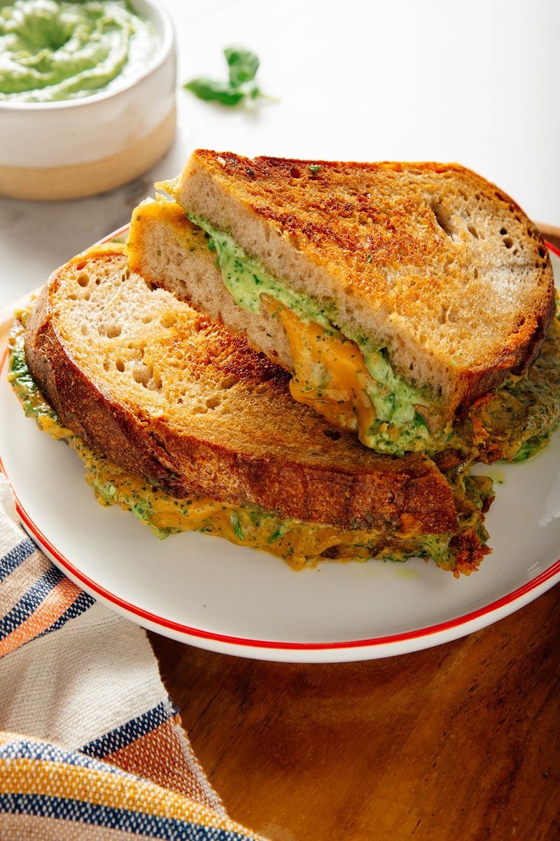 Grilled cheese sandwich with dollop of basil sauce