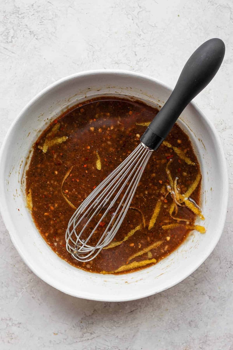 Whisked balsamic chicken marinade in a white bowl