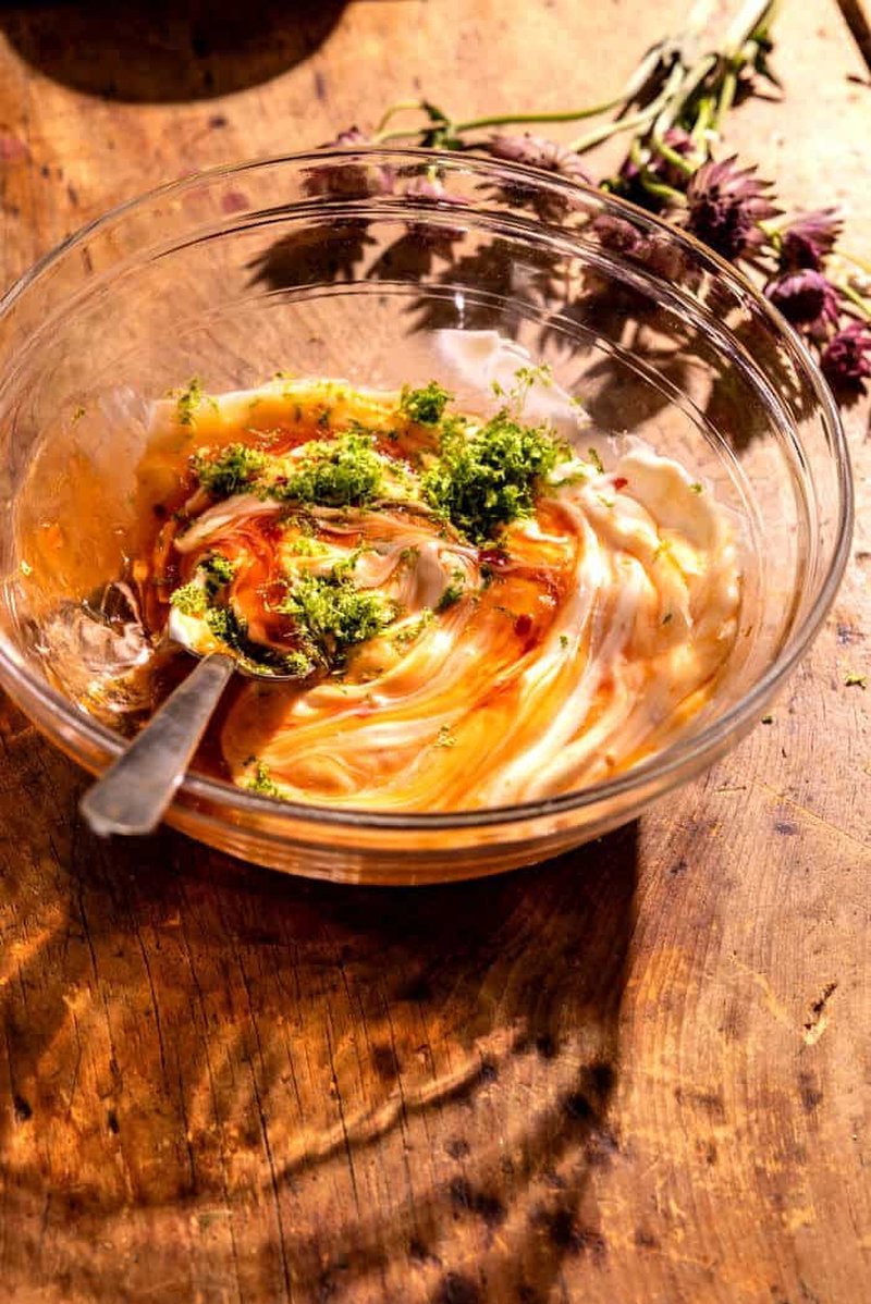 Prep bowls with slaw, rice, and sauce ingredients