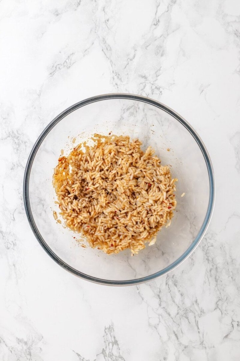 Rice mixed with soy sauce sesame oil on tray