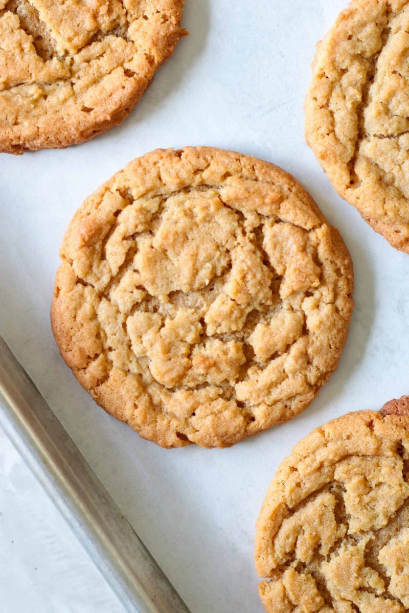 Crackly peanut butter cookies with no fork marks on tray
