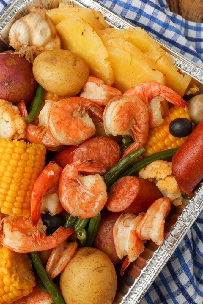 Close-up of the finished shrimp boil with vegetables and shrimp