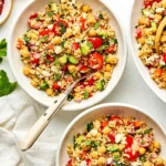 Colorful quinoa salad with feta and herbs in a ceramic bowl