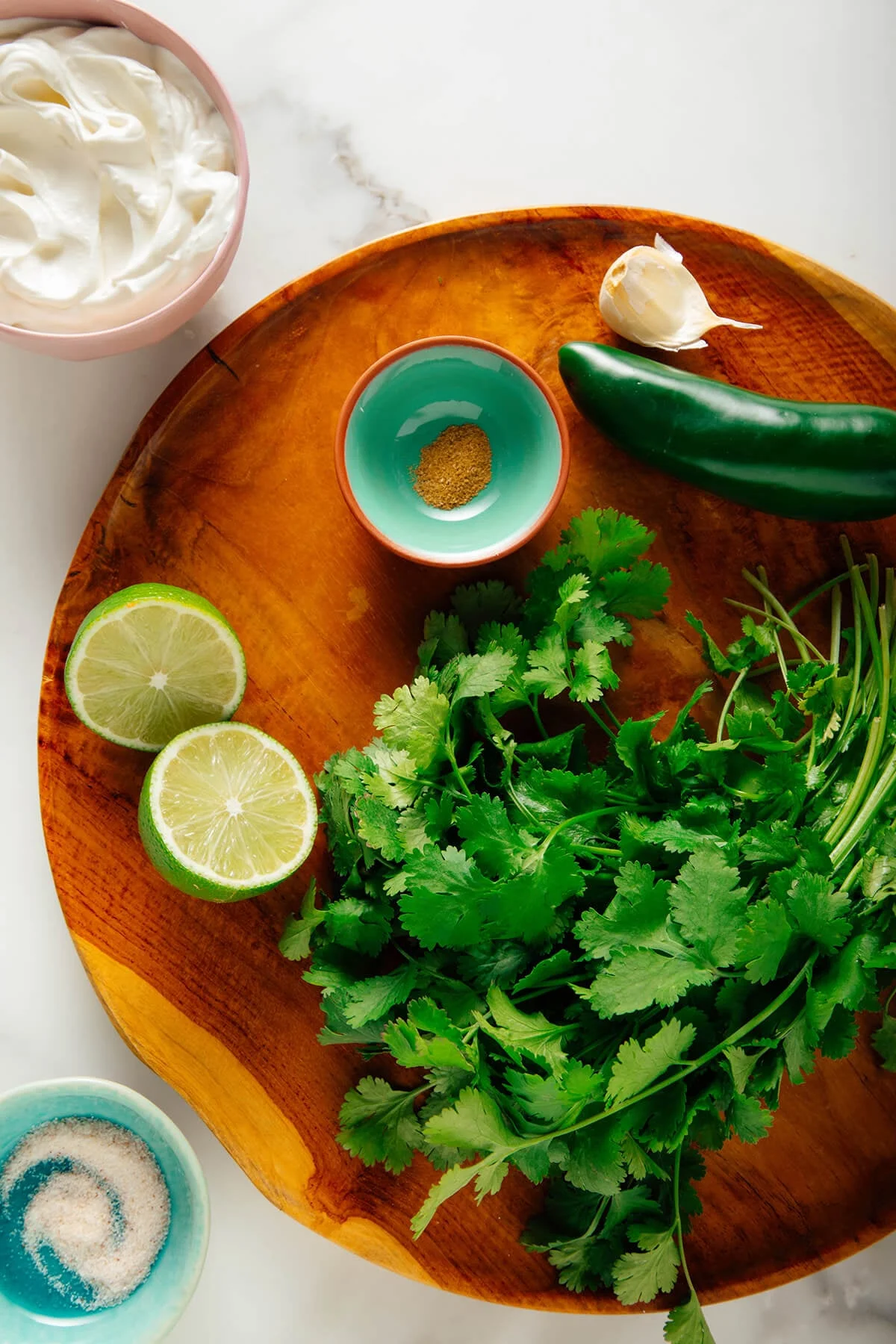 Fresh ingredients laid out for cilantro lime sauce