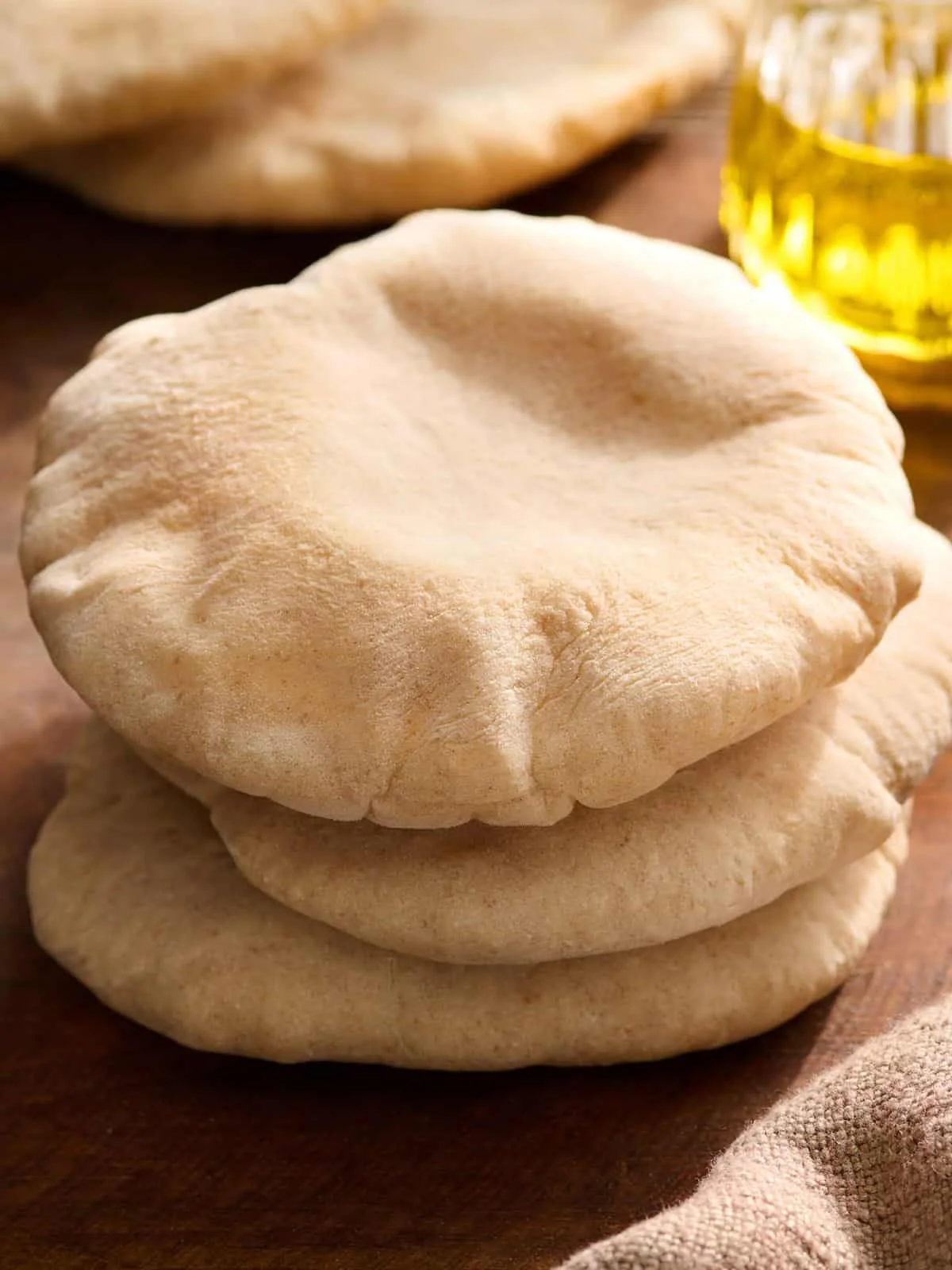 Tall stack of soft homemade pita breads