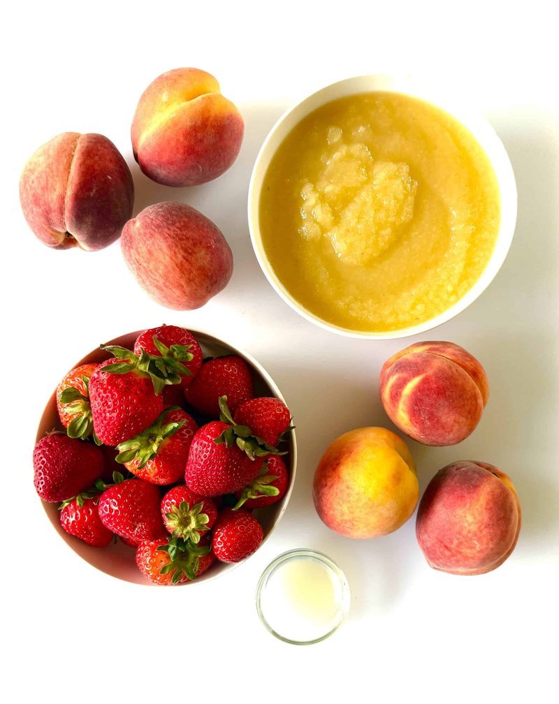 Blender full of fresh fruit and applesauce ready to puree