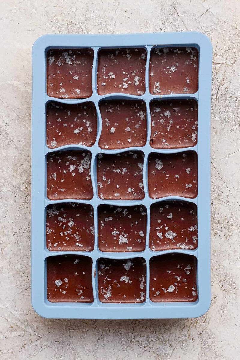 Finished mint-chocolate protein bites dusted with flaky sea salt